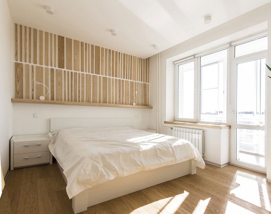 Minimal and luxurious bedroom in white with warm wooden tones