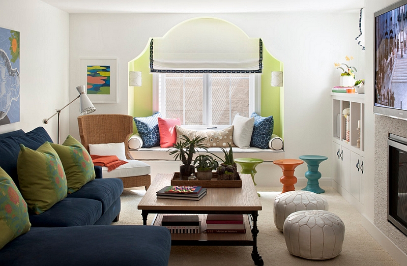 Moroccan Leather Poufs and colorful stools bring the Middle Eastern charm to the room