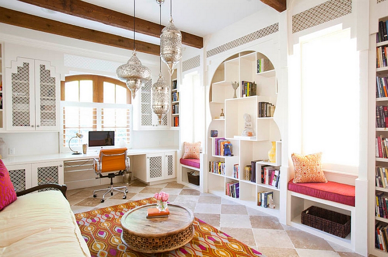 Multiple architectural details, curved doorways and Moroccan-inspired lights shape this living room