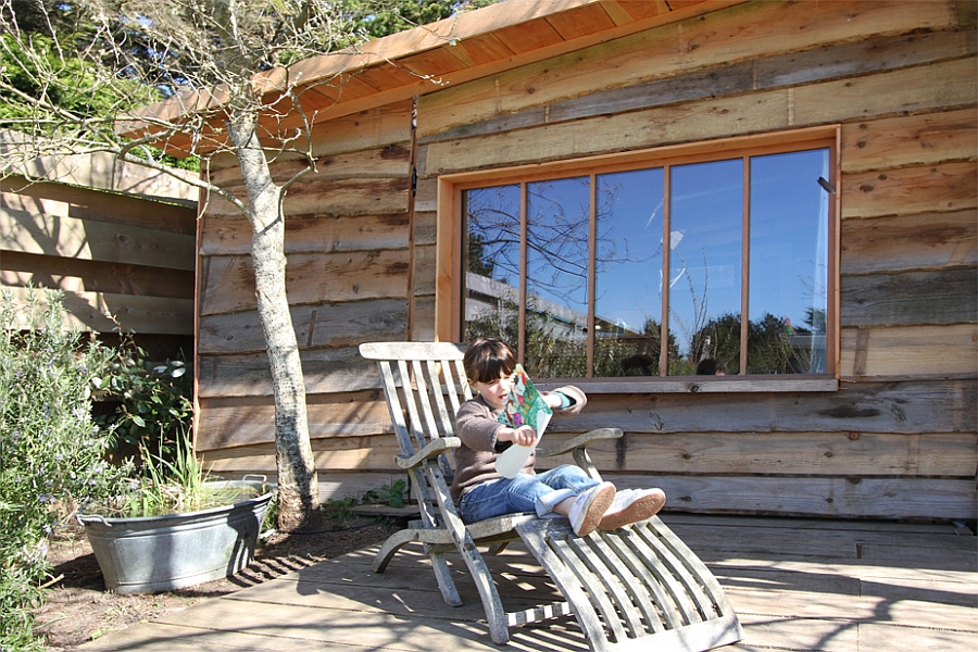 Outdoor landscape complements the interior of the cabin