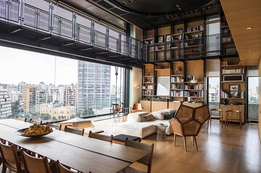 Plush decor and wooden walls bring warmth to the steely penthouse