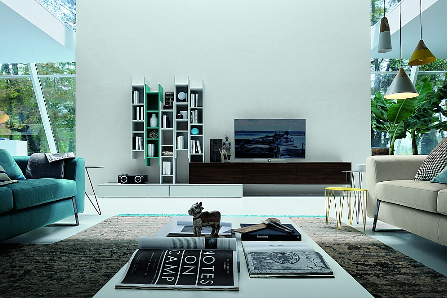 Pops of varying blue and sleek, floating units define the stunning wall unit system