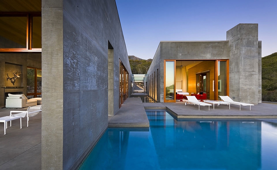 Refreshing pool outside the grand Toro Canyon house with a spacious deck