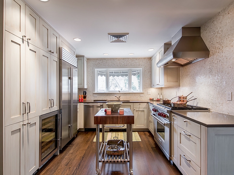 Rolling kitchen island adds visual excitement to the narrow kitchen layout