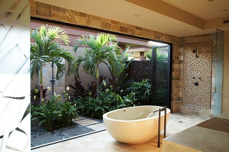 Serene Zen bathroom that opens up into the backyard with a freestanding tub