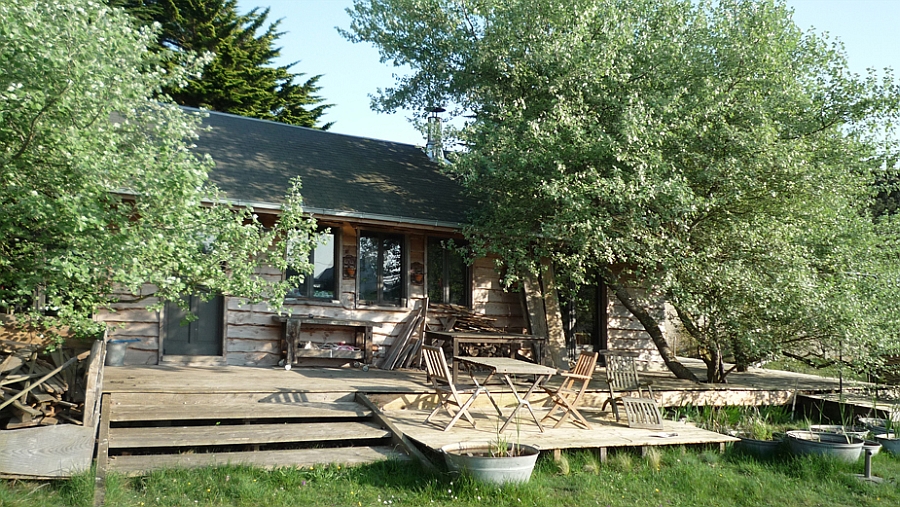 Simple and beautiful deck space of the rustic cabin in the woods