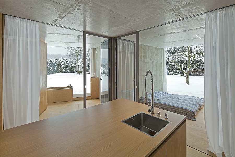 Simple and minimal kitchen island covered in wood