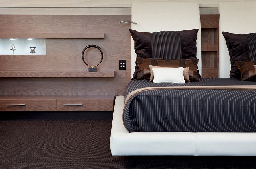 Sleek bedside additions and a cool platform bed give the room a more masculine vibe