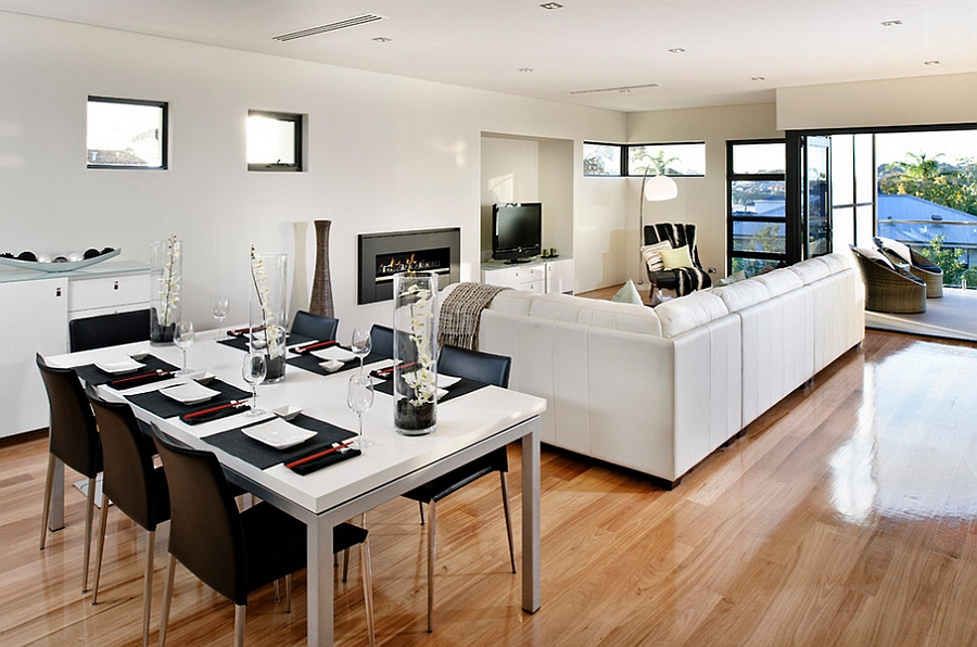 Sleek fireplace helps define the living space in an open floor plan