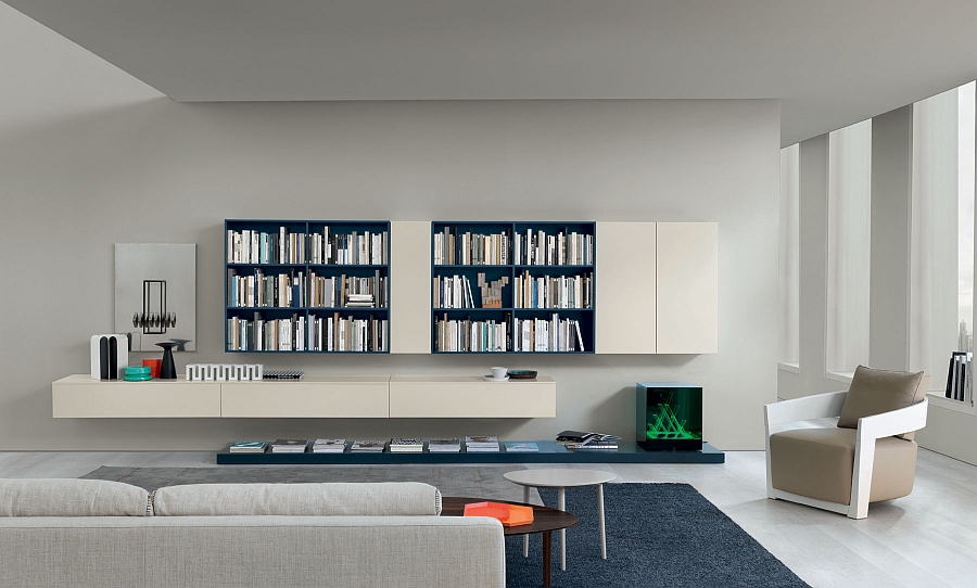 Sleek wall units in white offer ample display and storage space in the living room