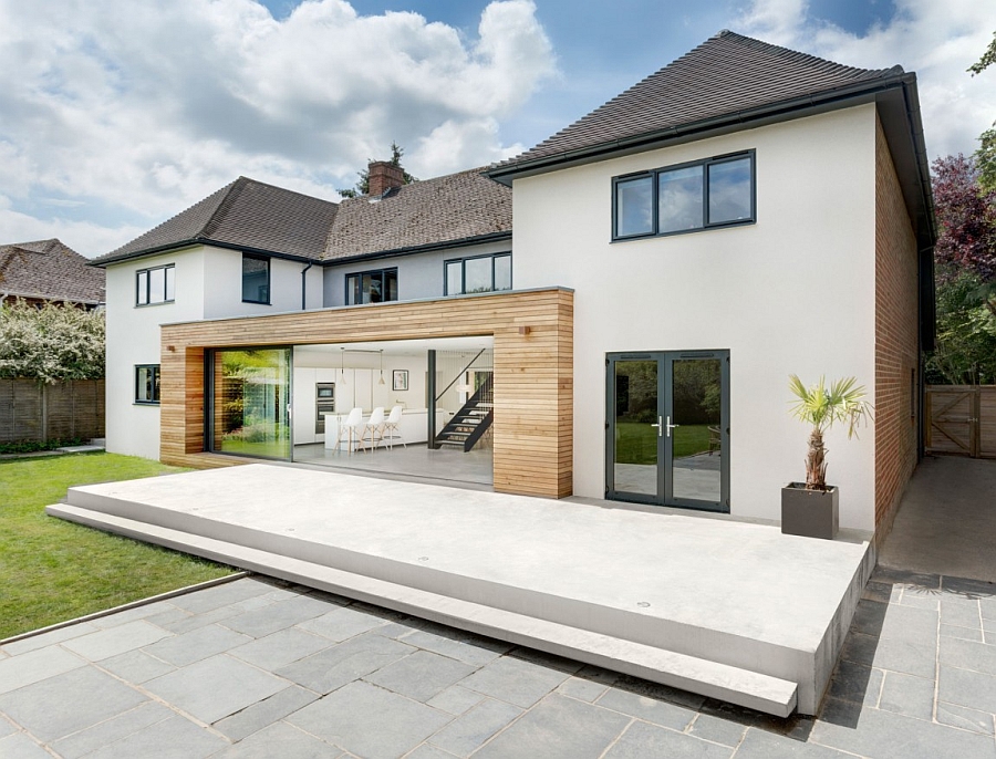 Classic English Home Gets A Grand Contemporary Update In Sparkling Style   Sliding Glass Doors Give The Home A Chic Contemporary Appeal 