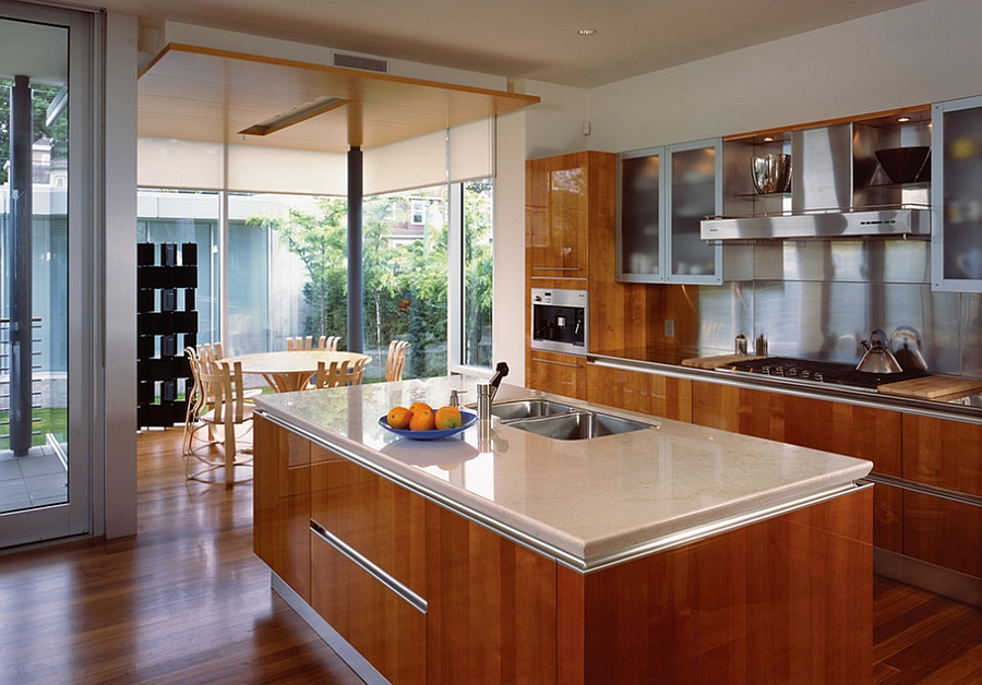 Small dining space next to the kitchen with the Hat Trick Chairs [Design: Kindred Construction]