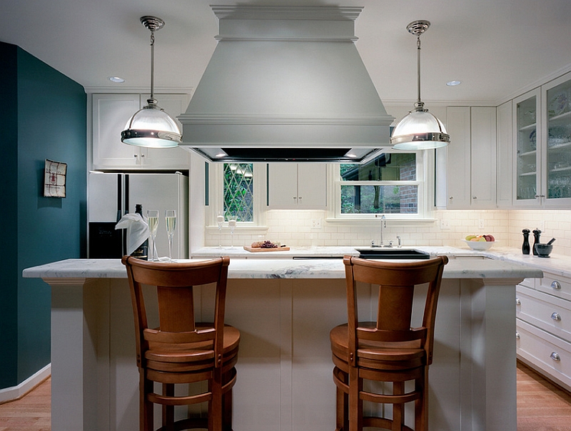 Smart teal accent wall in the white contemporary kitchen