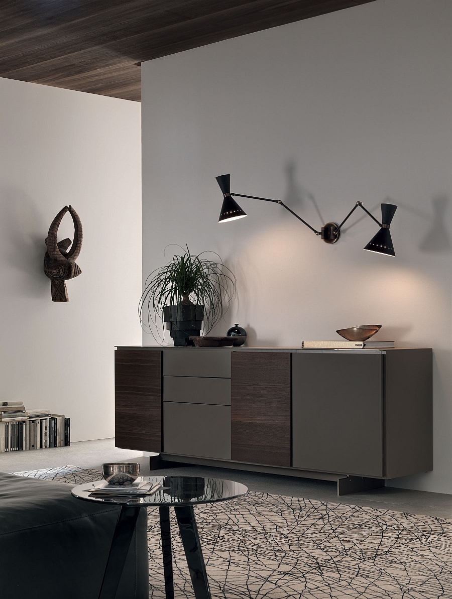 Smart wall sconces provide accent lighting for the sleek wall unit