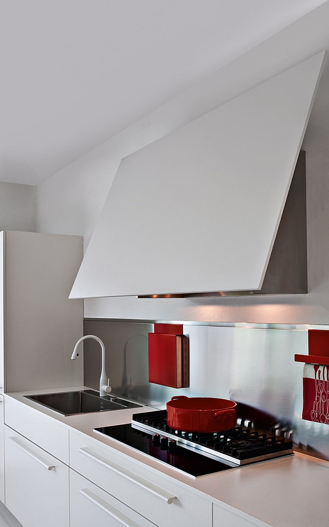 Space-saving kitchen cabinets that dissapear into the wall