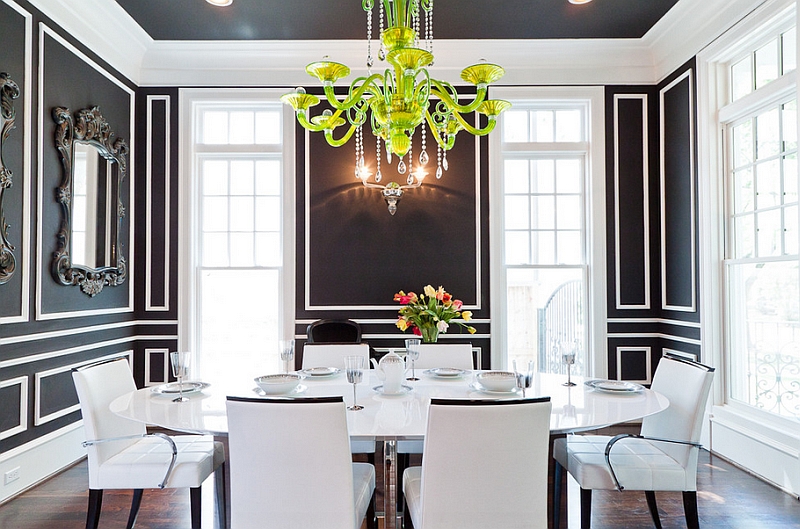 Sparkling chandelier becomes even more evident thanks to the black and white backdrop