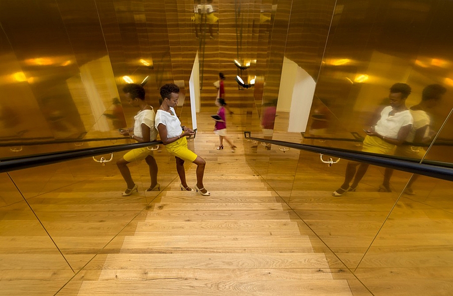 Staircase inside the office with a golden tinge