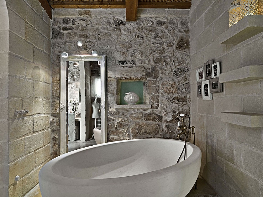 Standalone bathtub steals the show in the rustic bathroom