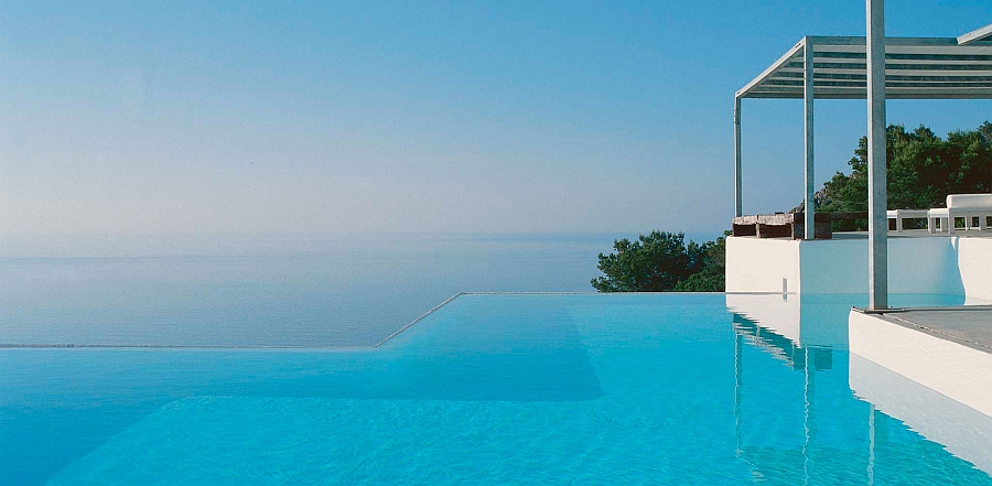 Stunning minimalist villa in Ibiza with infinity pool overlooking the ocean