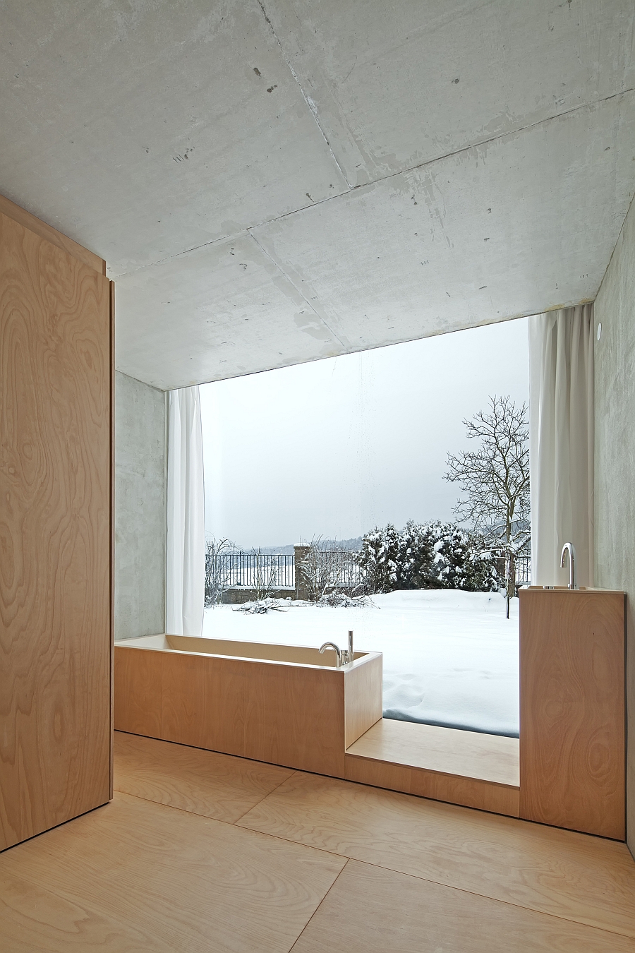 Stylish bath with a view of the scenic landscape outside