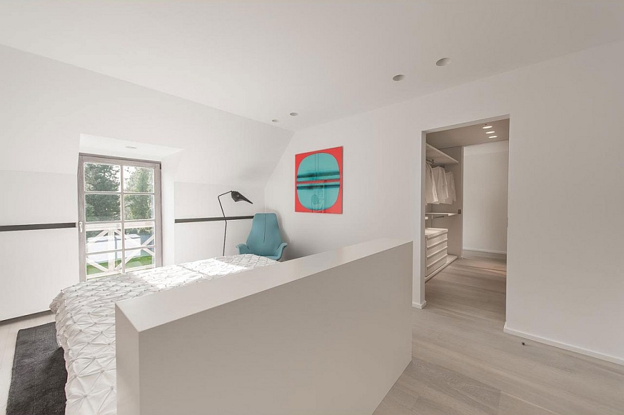 Stylish contemporary bedroom in white with ample natural ventilation