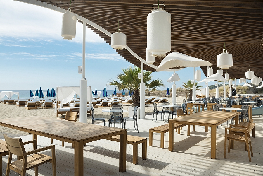 Stylish lighting fixtures and outdoor decor shape the Beach Club in Ibiza