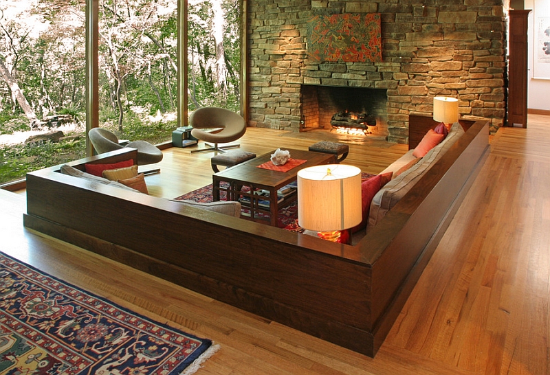 Stylish sunken living room helps break up the monotony of the open plan interior