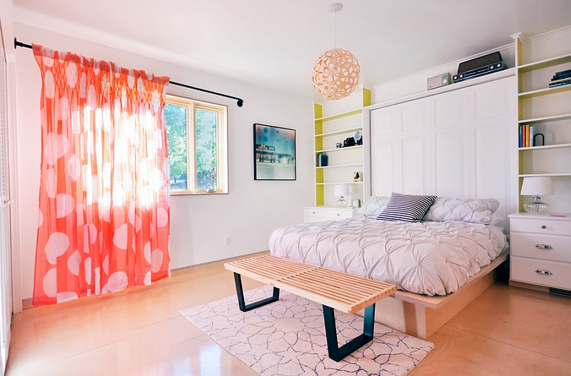 The light orange light filteing into the room adds to the beauty of the coral pendant