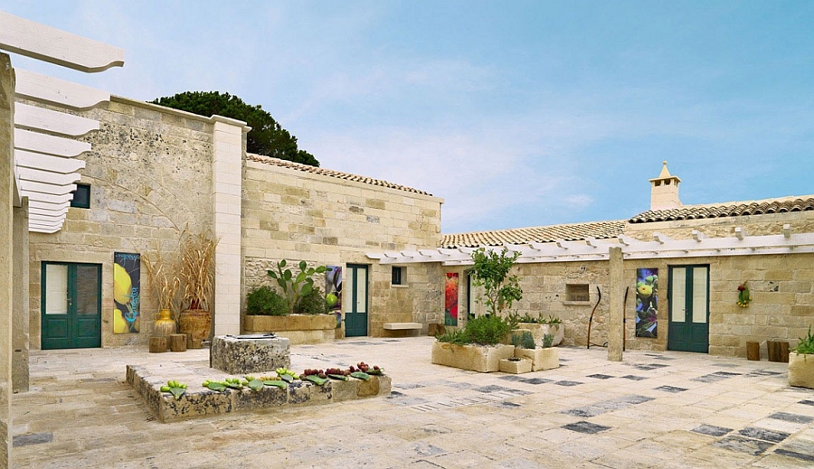 Traditional Italian architecture and lovely courtyards greet you at the Relais Masseria Capasa