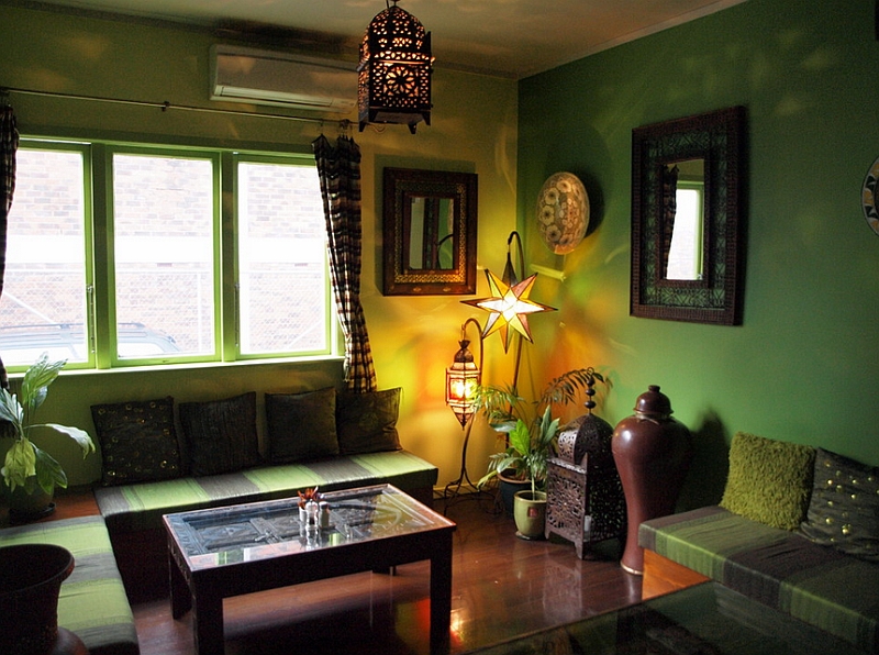 Tropical colors coupled with Moroccan lantern and fabric in the cool living room