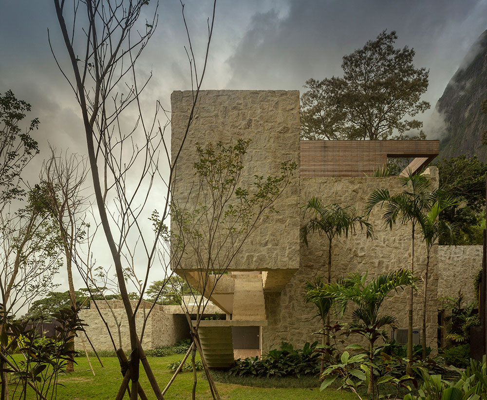 Unique facade of the house surrounded by a lovely landscape