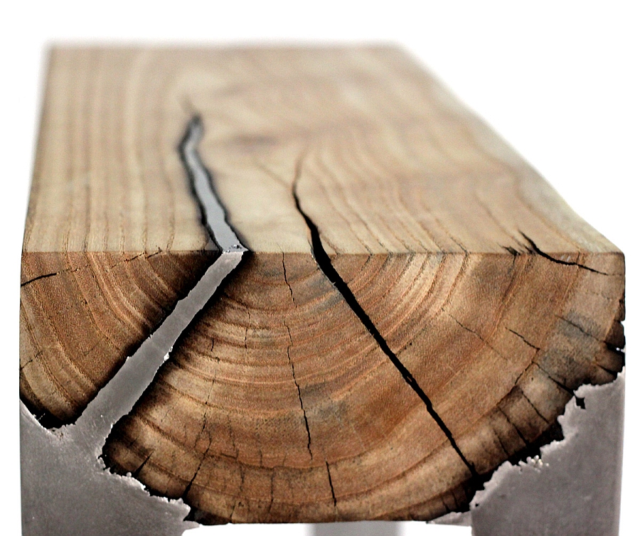 Aluminum moves through the cracks of the tree trunk to create a natural fusion