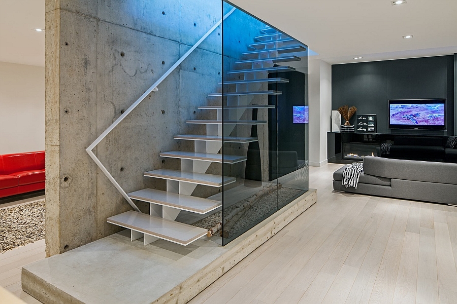 Basement living space complete with entertainment unit and fireplace