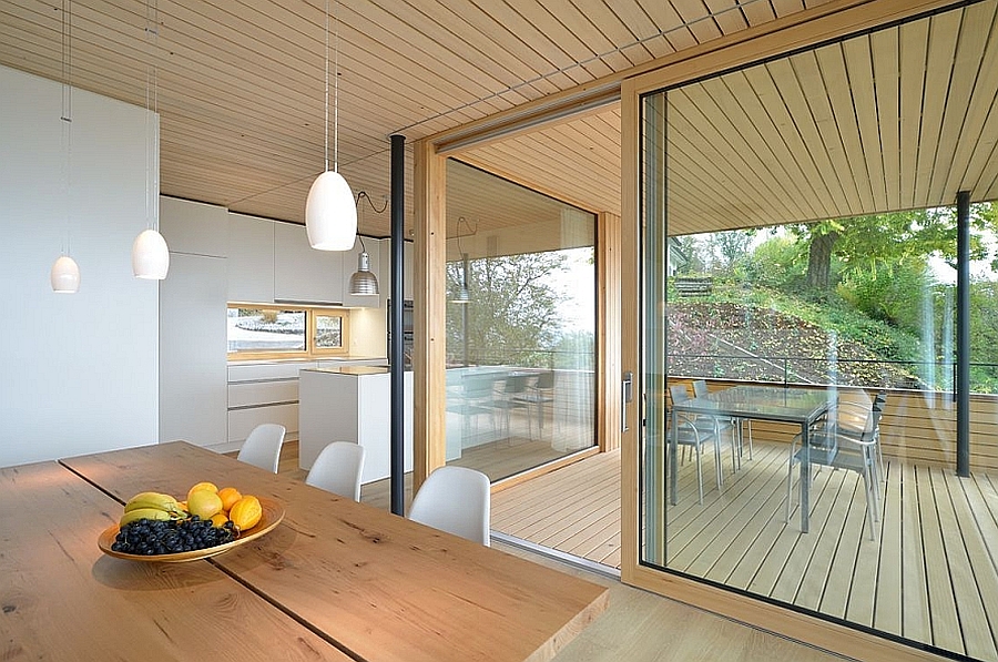 Beautiful balance between wood, concrete  and glass isnide the house