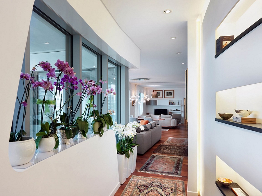 Beautiful use of flowers and potted plants to enliven the corridor