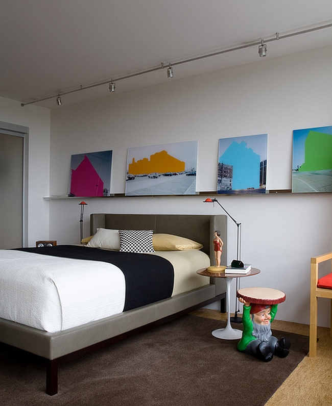 Colors of the wall art complement those of the gnome [Design: Johnson Berman]