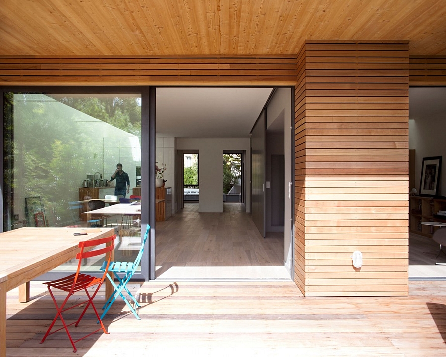 Extended deck of the house brings the living space outdoors