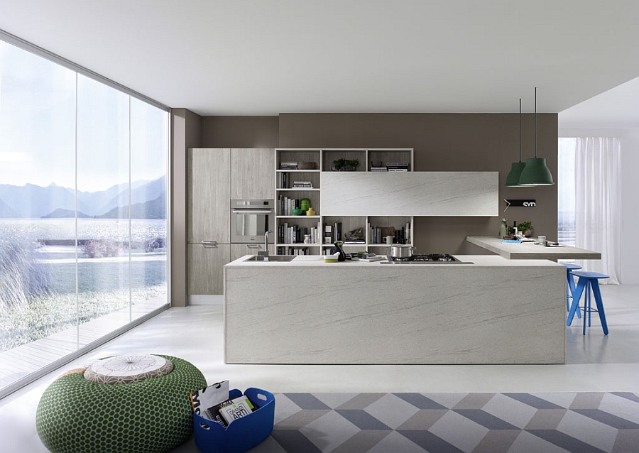 Green pendant lights and blue bar stools add color to the contemporary kitchen