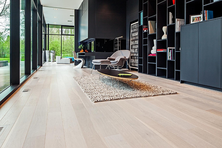 Iconic elliptical coffee table and Womb Chair steal the show here