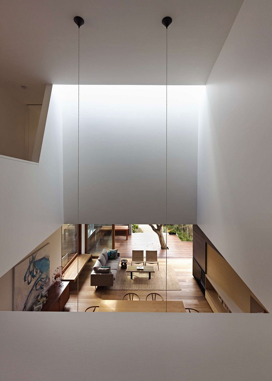 Large skylights and openings allow light to filter down to the lower level
