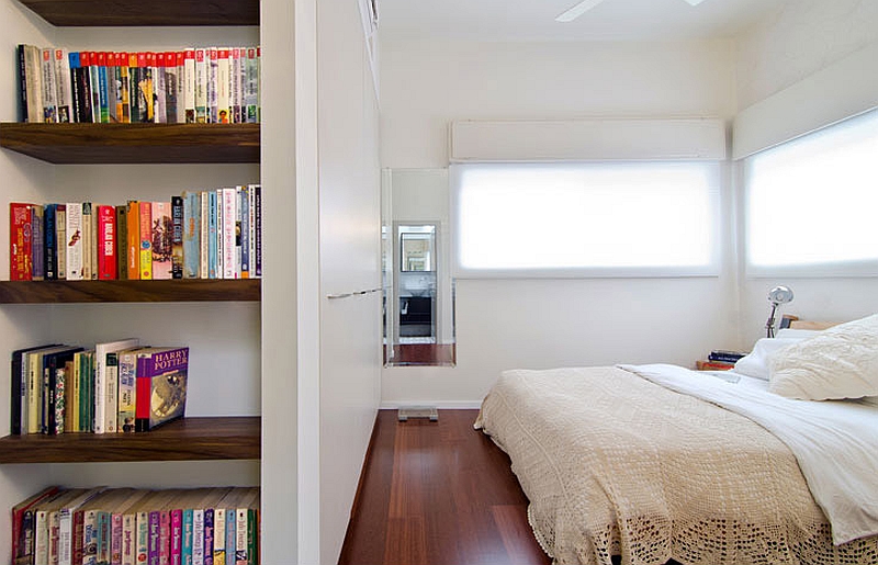 Lovely corner shelf in the trendy apartment bedroom saves up on space