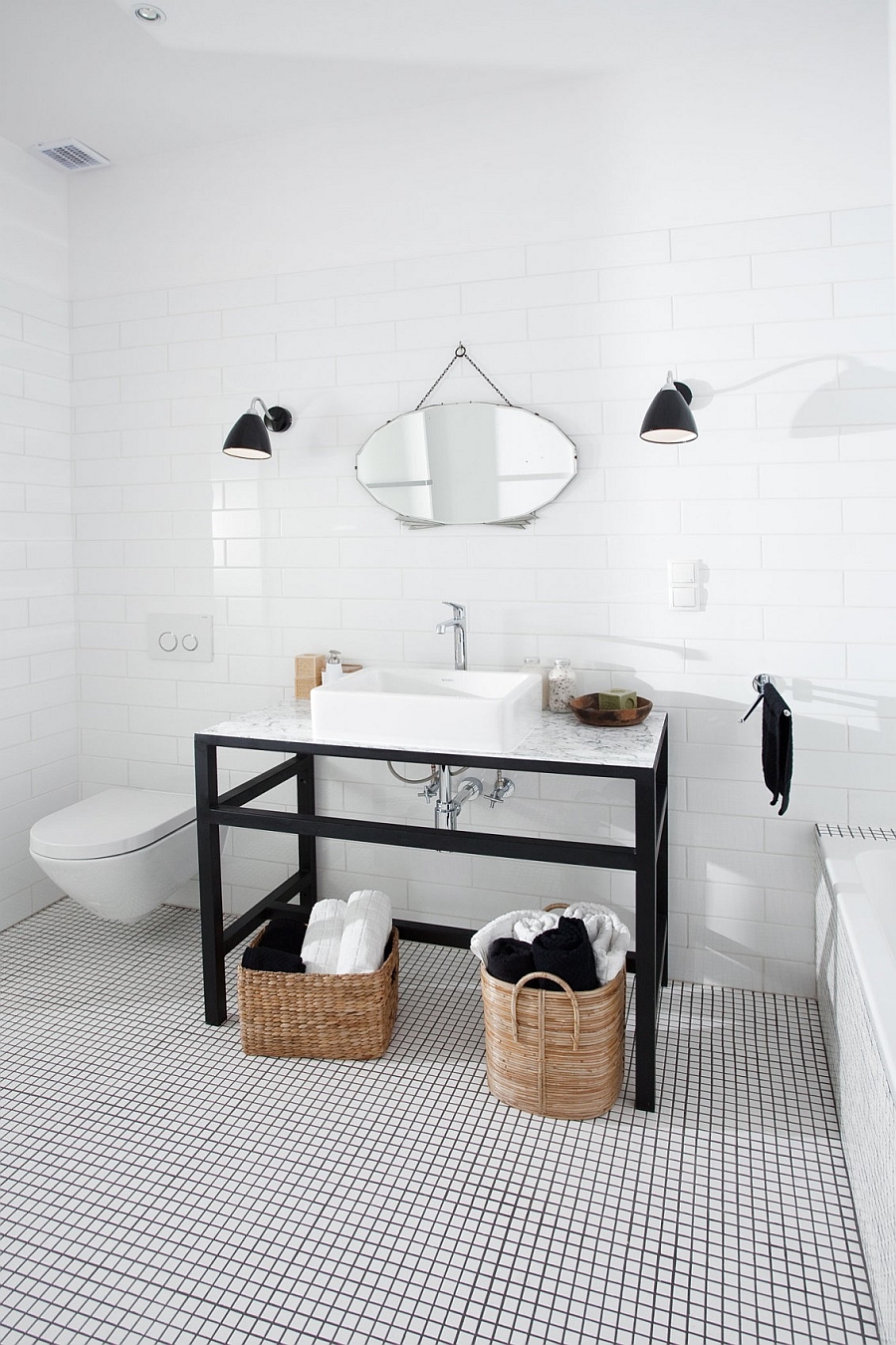 Luxurious modern bathroom in black and white in the Warsaw apartment