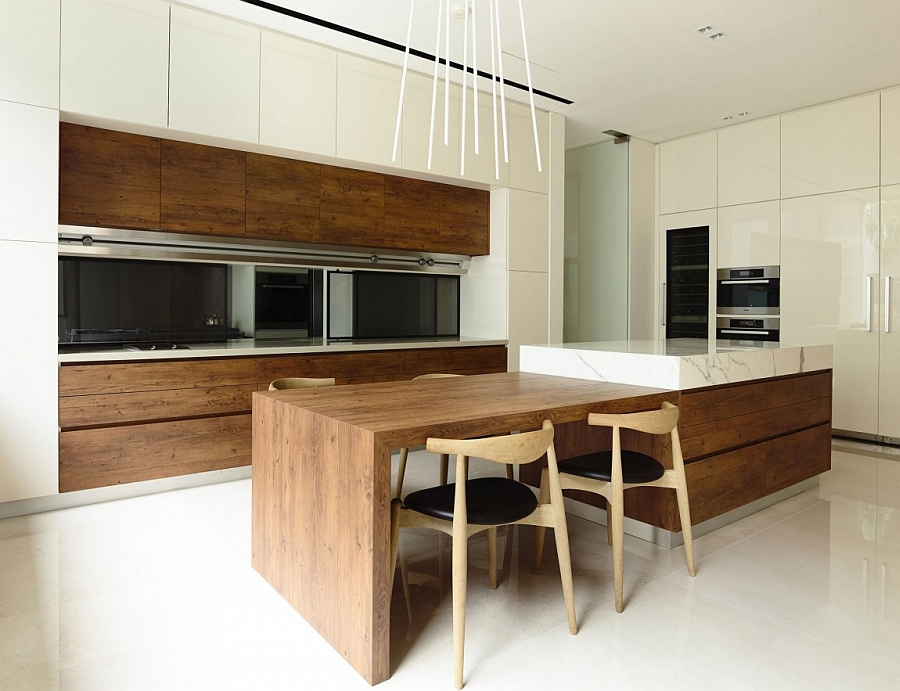 Minimal modern kitchen and dining area with warmth of natural wood