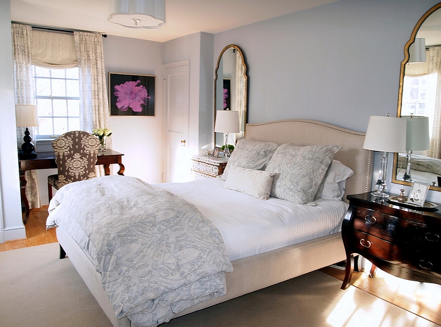 Pale grey and blue give the bedroom a serene backdrop [Design: Elizabeth Reich]