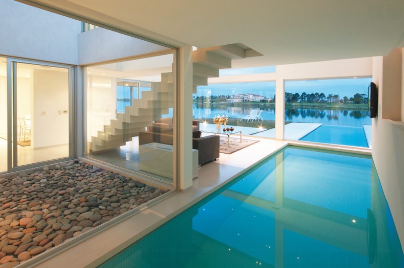 Pool house with a lagoon view