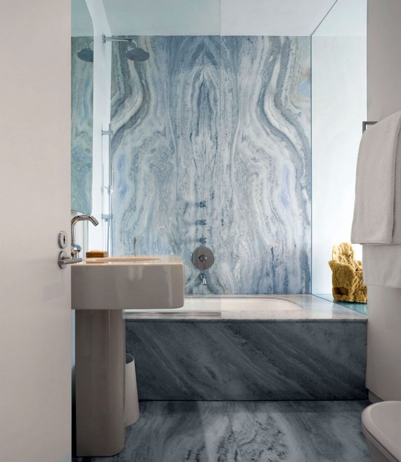 Sleek bathroom with blue-toned marble