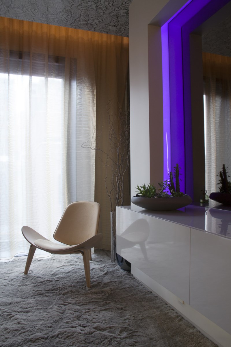 Sleek bedroom with modern lighting