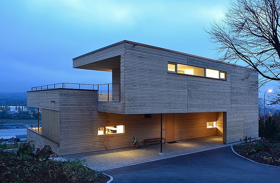 Street facade of the private Swiss home after sunset