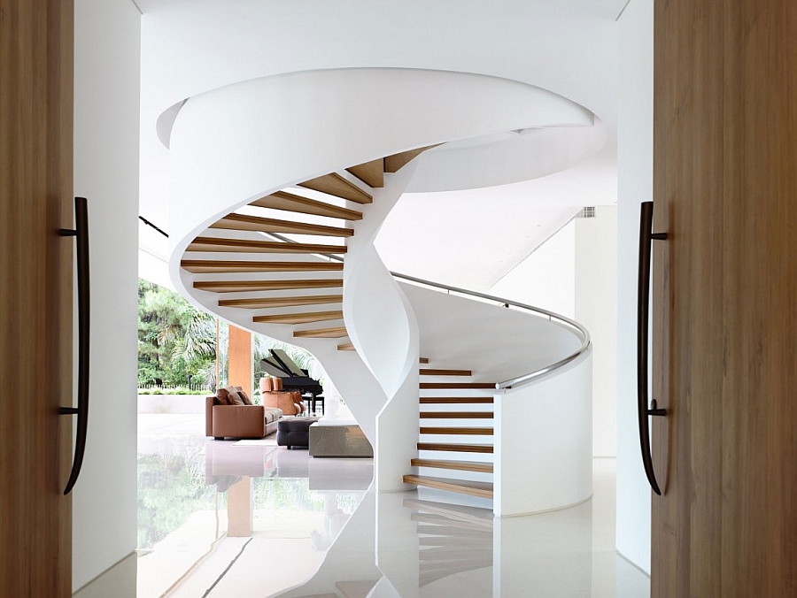Stunning spiral staircase at the entrance of the house