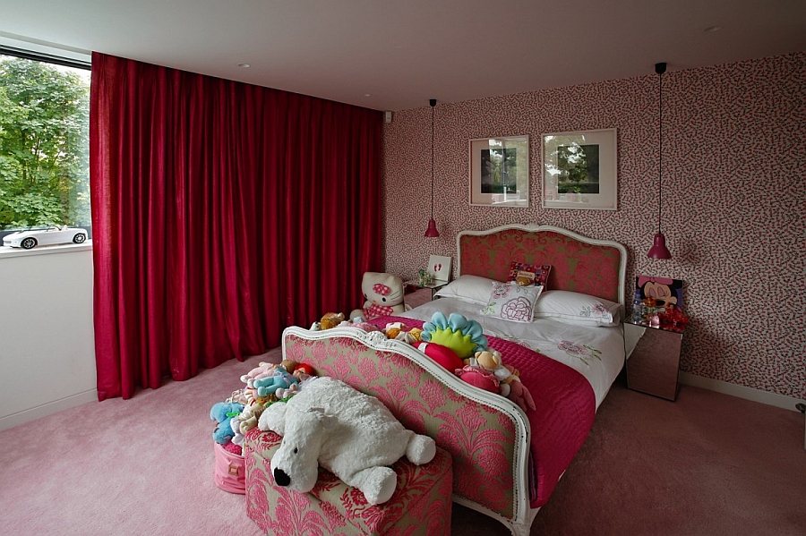 Stylish girl's bedroom in pink and red